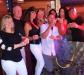 Seacrets “Party Bar” toasting Cheers to Kim (center in black hat) on her Birthday. photo by Terry Kuta